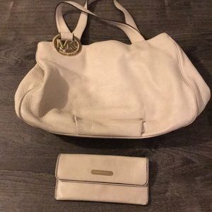 White Michael Kors purse and wallet set